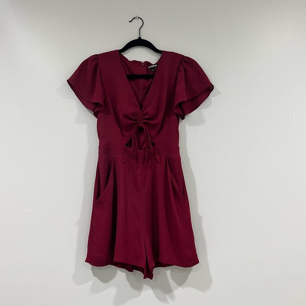 Women’s Express romper. Burgundy with zipper in the back , size 0 100% polyester